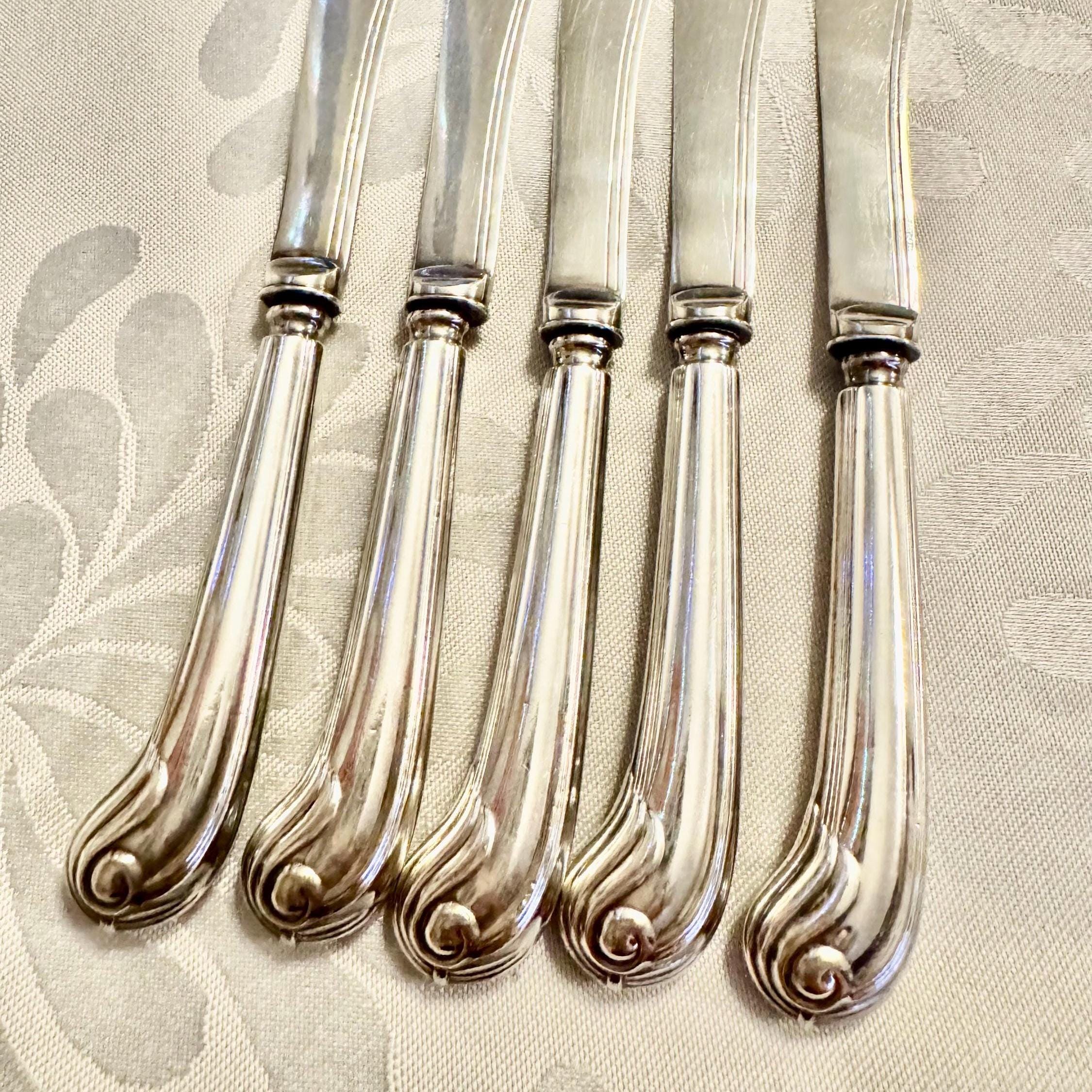 Antique Pistol Grip Butter Spreaders – Set of 5 – Sheffield, England – c. 1890s–1900s, front view
