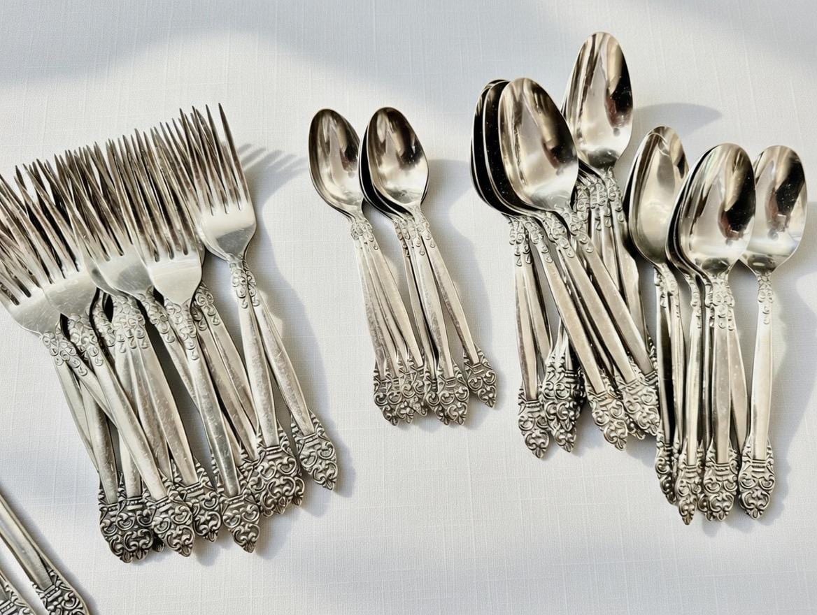 Vintage Northcraft Stainless Steel Flatware Set • Ornate Scroll Pattern, Japan, front view