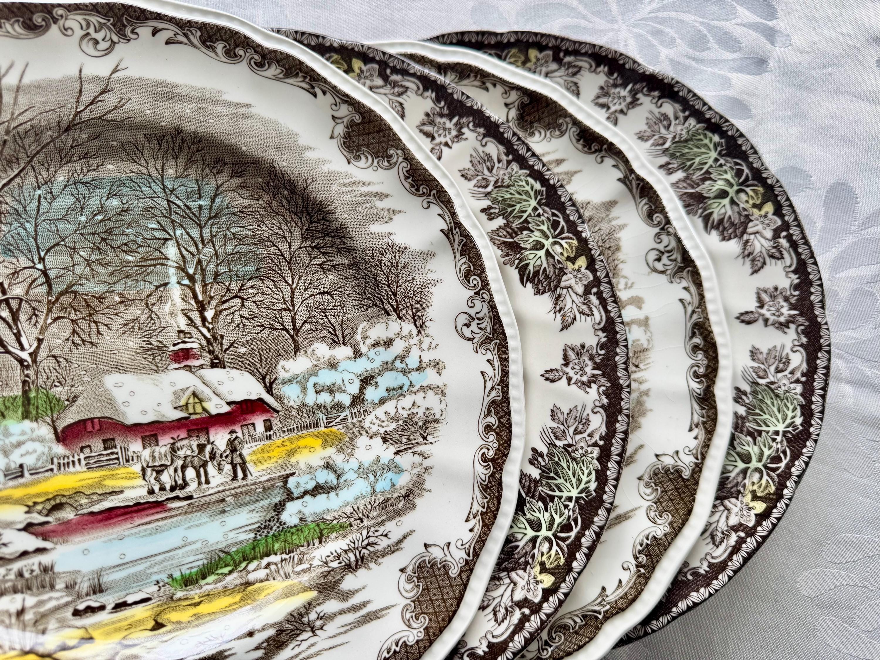 Vintage Winter-Themed Dinner Plates 10” – Johnson Bros “Friendly Village” & Kensington Ironstone “Shakespeare’s Sonnets”, front view